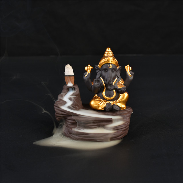 Cerámica dorada Ganesha Reflujo Quemador de incienso Contraflujo en cascada Smog