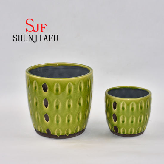 Maceta de cerámica verde para decoración