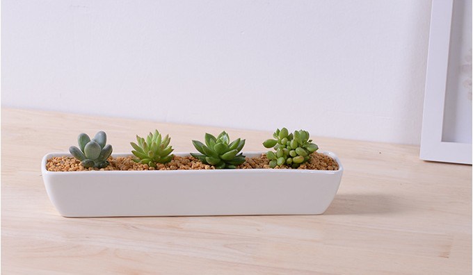 Maceta de cer&aacute;mica blanca cuadrada