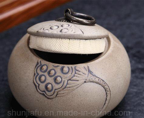 Tu exquisita jarra de té de cerámica con patrón de hoja de loto exquisita