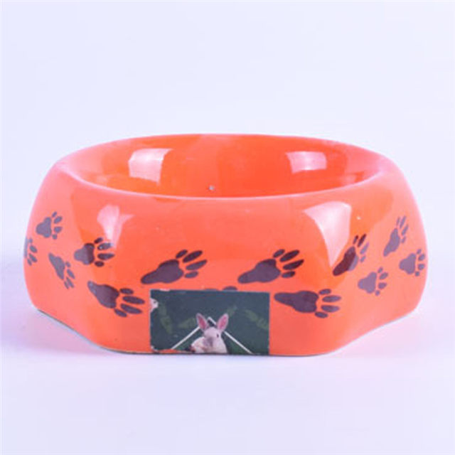 Polígono Estilo Orange Glaze Bowl Orejas de perro impresas en la parte inferior Alimentador de cerámica para mascotas Tazón de cerámica para perros