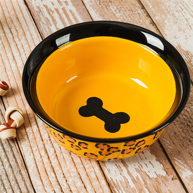 Impresión del fondo del tazón Imágenes de huesos Alimentador de cerámica para mascotas amarillo Recipiente de cerámica para perros circular