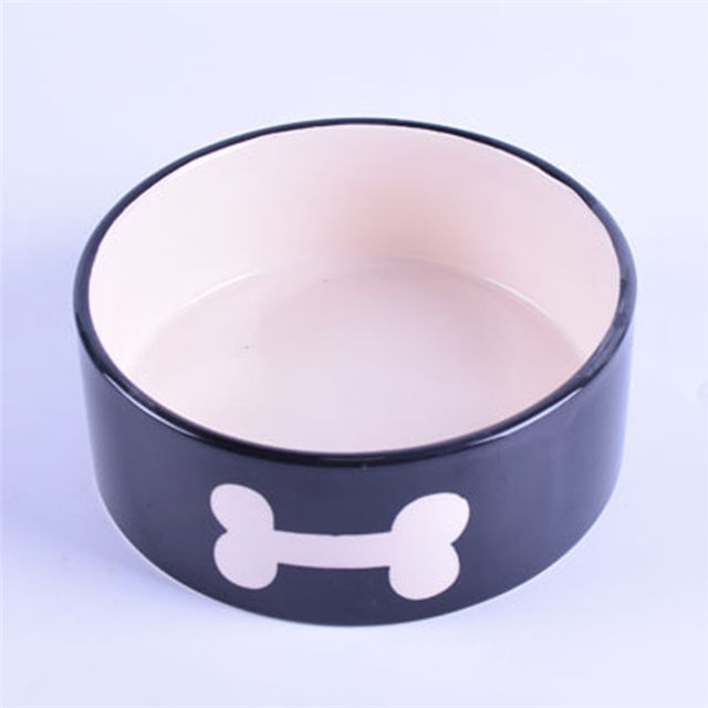Comedero para mascotas de cerámica con hueso blanco impreso con esmalte negro