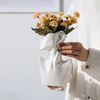 Estatua de cerámica moderna al por mayor del busto del florero de la cara para la decoración casera, soporte de exhibición de la joyería de las macetas de la cabeza humana de la porcelana de encargo del OEM
