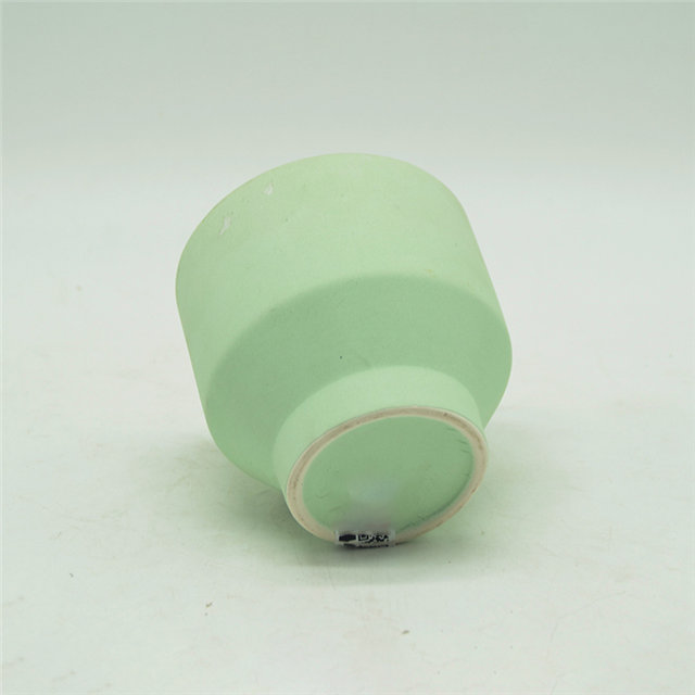 Velas de cerámica verde claro