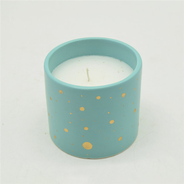 Velas de cerámica moteadas de azul y oro