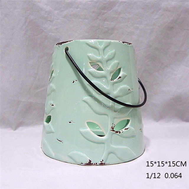 Muebles para el hogar Decoración Naranja rojo Cilindro de cerámica Forma de tira Estilo Ahuecando Huracán Linterna de cerámica